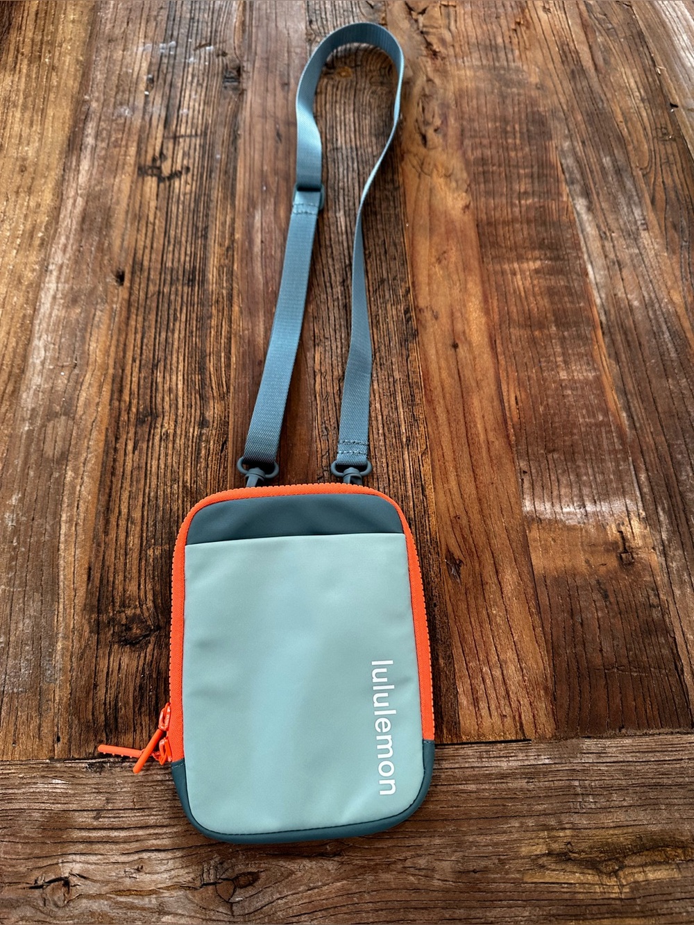 lululemon athletica Light Green Crossbody Pouch with Orange Trim and Gray Strap